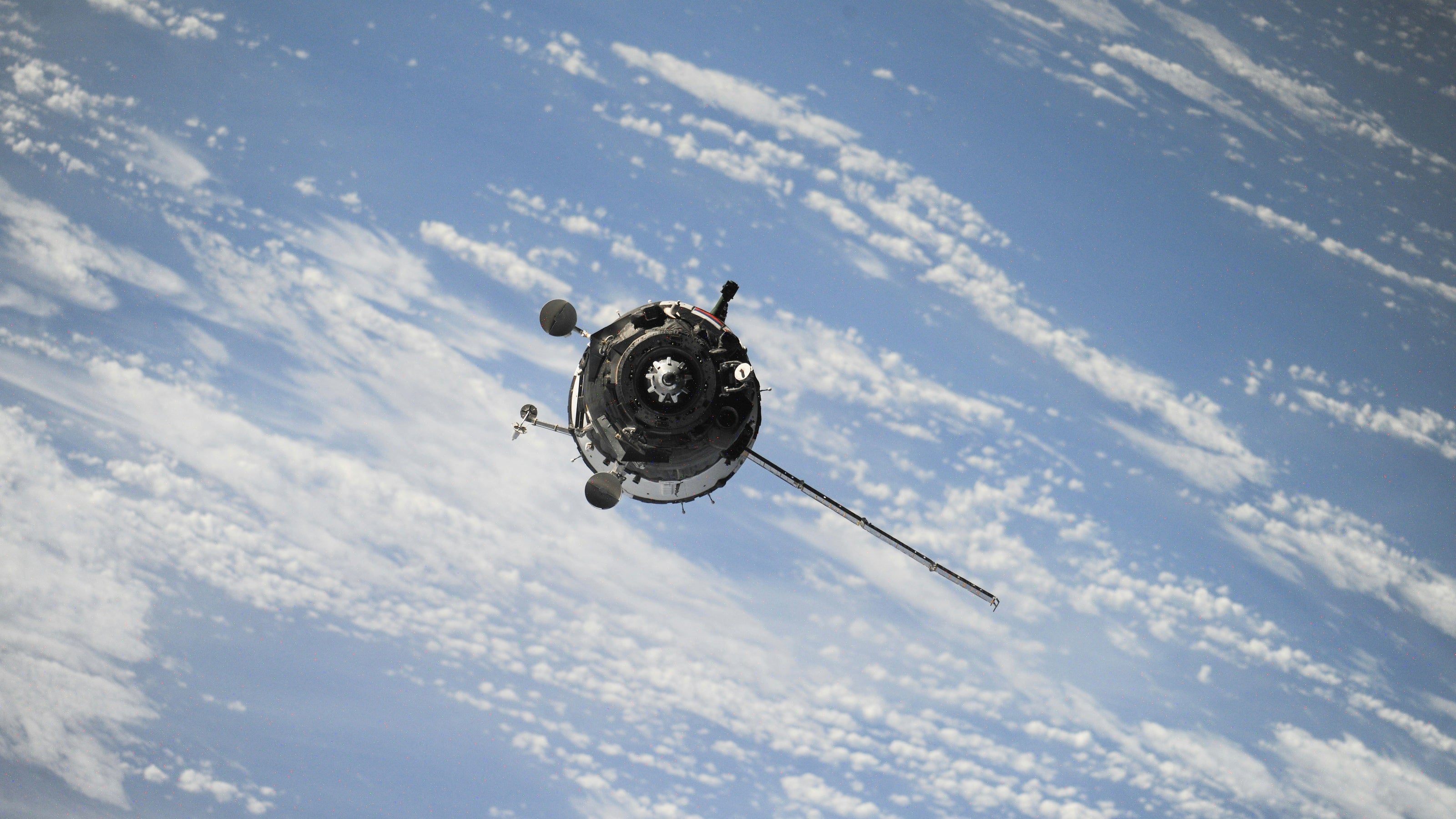 space traveler, satellite, feature image by going across