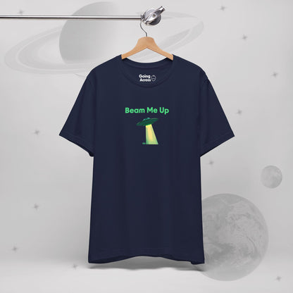 Going Across men's basic t-shirt, on a hanger, in navy featuring the text ‘Beam Me Up’ and space art of ufo in celestial green by Manharleen.