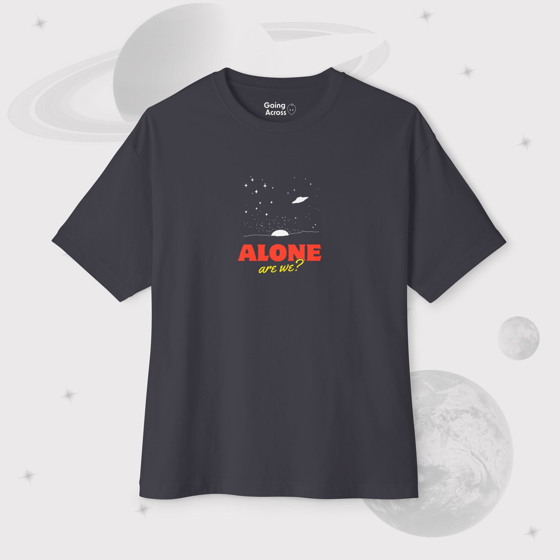 Men's Going Across oversized boxy t-shirt dark grey, front, featuring the text ‘ ALONE Are We?’ and space art of the universe and ufo by Manharleen.