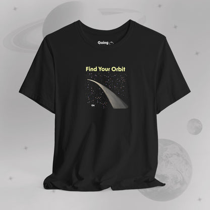 Going Across men's basic t-shirt in black, featuring the text ‘Find Your Orbit’ and space art of an orbit and a starry sky by Manharleen, hanging.