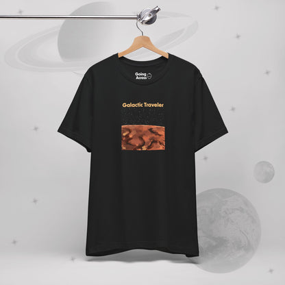 Going Across men's basic t-shirt in black, hanging, featuring the text ‘Galactic Traveler’ and space art of a red planet and a starry sky by Manharleen.