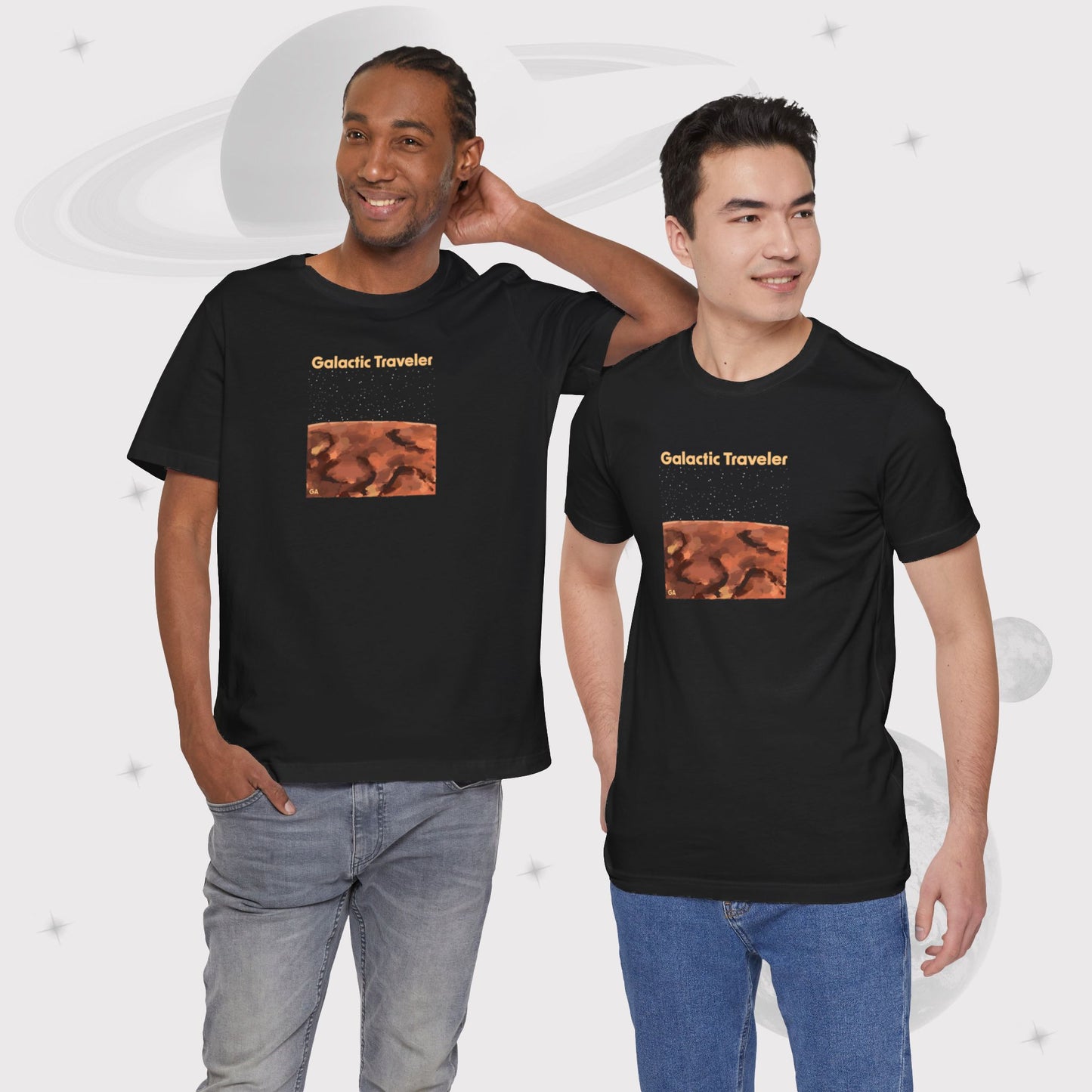 Two men wearing Going Across men's basic t-shirt in black, featuring the text ‘Galactic Traveler’ and space art of a red planet and a starry sky by Manharleen.