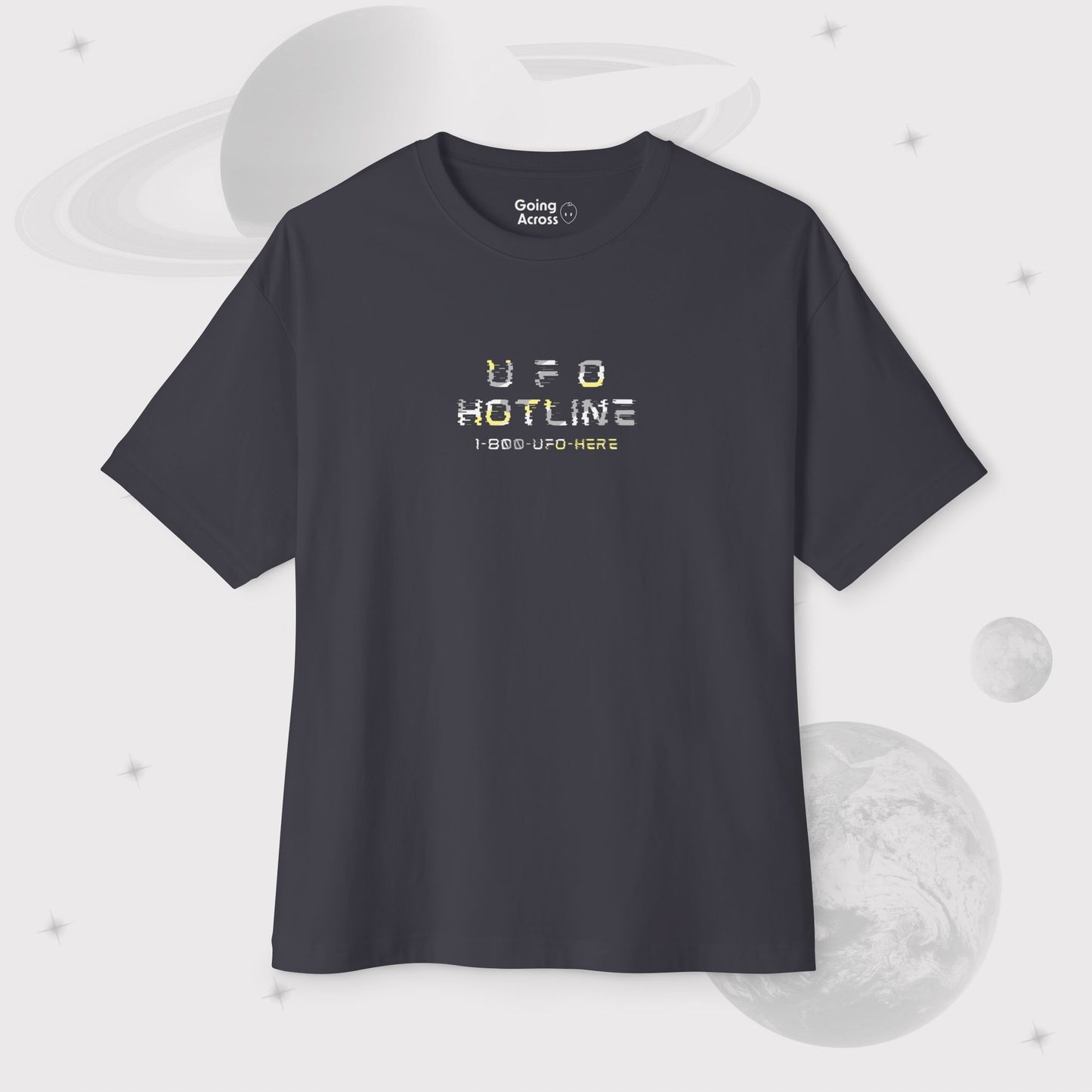 Going Across men's oversized boxy t-shirt in dark grey, featuring the text ‘UFO HOTLINE’ space art by Manharleen.