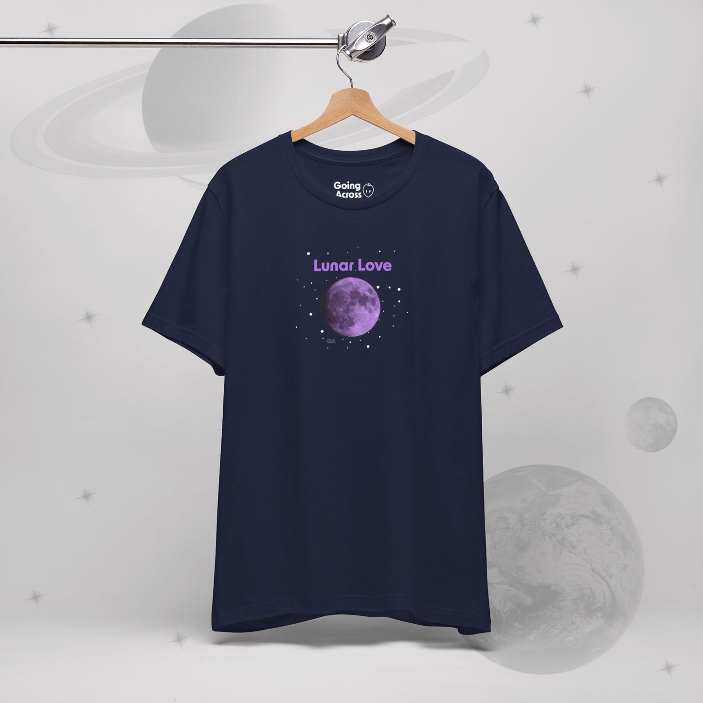 Going Across women's basic t-shirt in navy hanging, featuring the text ‘Lunar Love’ with space art of purple lavender full moon by Manharleen.