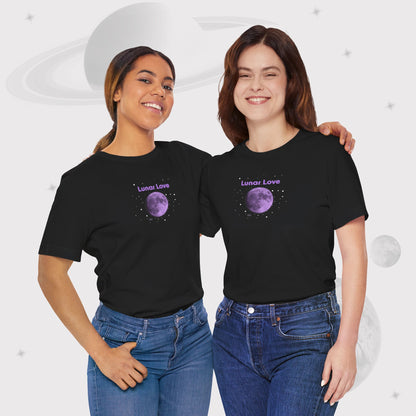 Two women wearing Going Across women's basic t-shirt in black, featuring the text ‘Lunar Love’ with space art of purple lavender full moon by Manharleen.