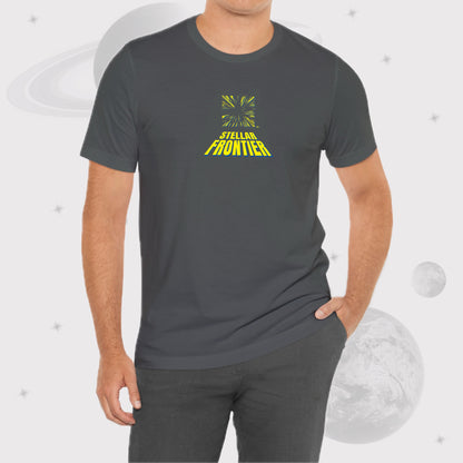 Man wearing Going Across men's basic t-shirt in grey/asphalt, with jeans, featuring the text ‘Stellar Frontier’ and vibrant yellow, deep blue space art by Manharleen.