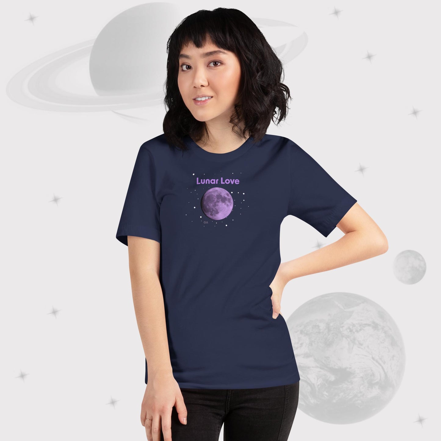 Woman wearing Going Across women's basic t-shirt in navy, featuring the text ‘Lunar Love’ with space art of purple lavender full moon by Manharleen.