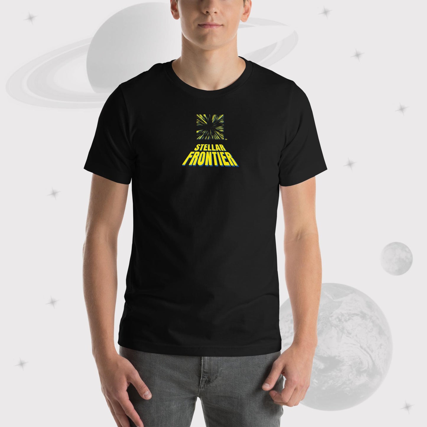 Man wearing Going Across men's basic t-shirt in black, with jeans, featuring the text ‘Stellar Frontier’ and vibrant yellow, deep blue space art by Manharleen.