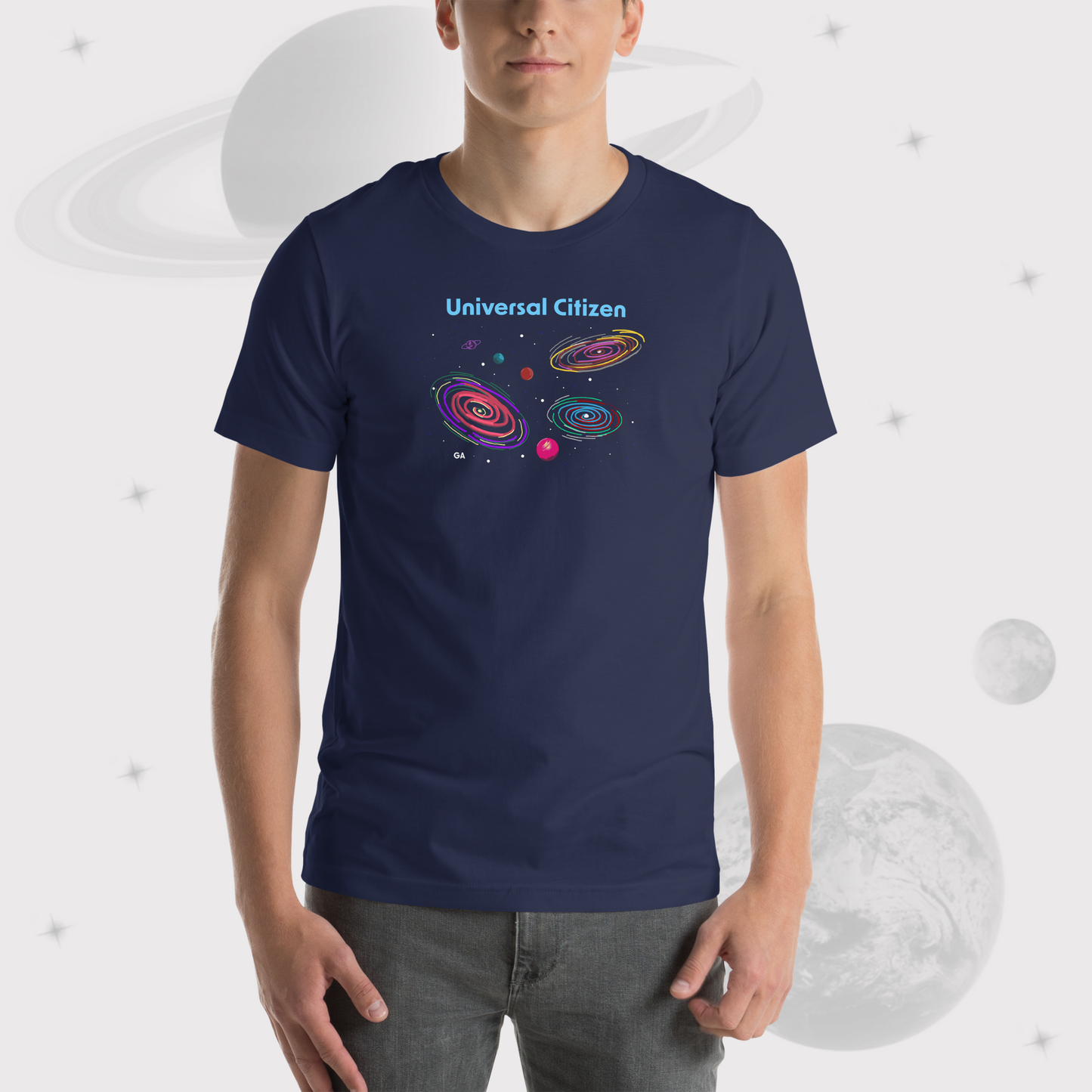 Zoom in of Man wearing Going Across men's basic t-shirt in navy, featuring the text ‘Universal Citizen’ with space art of vibrant galaxies and planets by Manharleen.