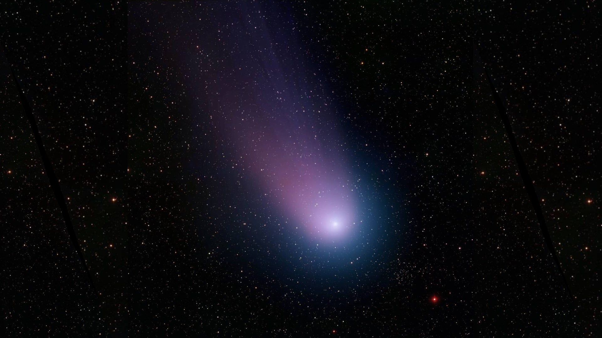 Dramatic shot of a comet streaking through the night sky, symbolizing the adventurous spirit of 'Going Across' space-themed clothing.